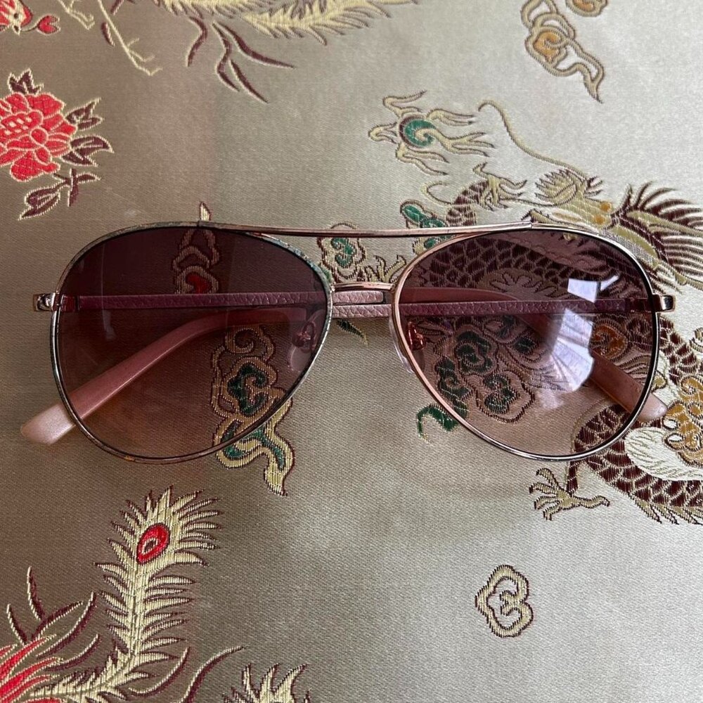 Rose gold aviator glasses